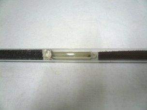 Tube for elementary analysis, detail of a sample cup